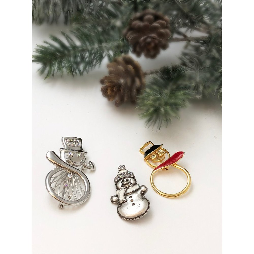 Snowman brooch Lot